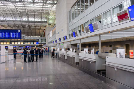 Frankfurt, Germany- 26 October 2015:Passengers waiting in a departures hall at an airport or train...