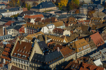 Various tiled roofs of historical buildings in Strasbourg city centerの写真素材