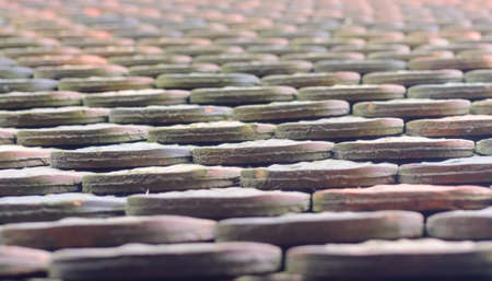 Extreme close up full frame view on objects which could resemble tires, fencing, fabric or other...