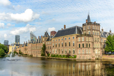 Hague, Netherlands - 28 July 2016:Magnificent chateau styled manor with river running alongside as clouds feather aboveのeditorial素材
