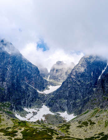 High Tatra mountains covered with clouds Sunny day, Lomnicky Stitの写真素材