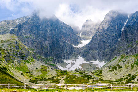 High Tatra mountains covered with clouds Sunny day, Lomnicky Stitの写真素材