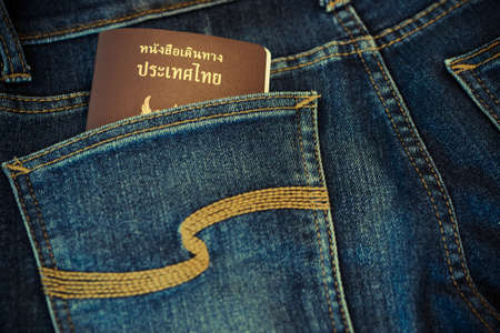 Thai passport in jeans pocketの写真素材