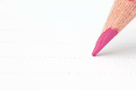 Close up of pencil writing on paper. Macro with extremely shallow depth of fieldの写真素材