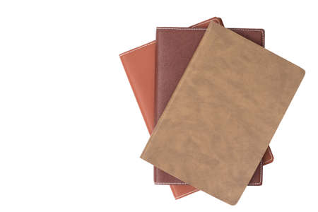 Top view on the pile of books isolated on white backgroundの写真素材