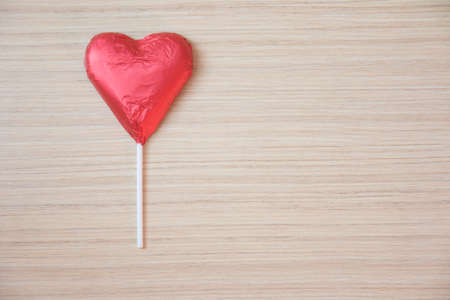 red heart on wooden background for valentine's dayの写真素材