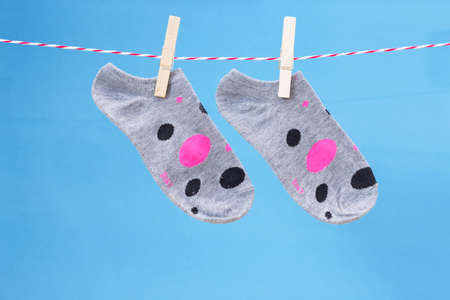 colored socks on the clothesline