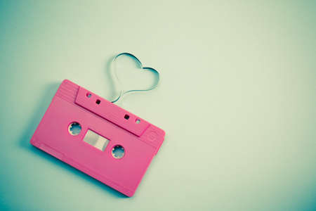 audio cassette with magnetic tape in shape of heart - vintage effect style pictureの写真素材