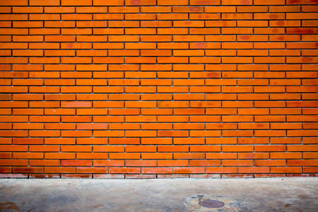 Empty grunge urban street red brick wall texture backgroundの写真素材