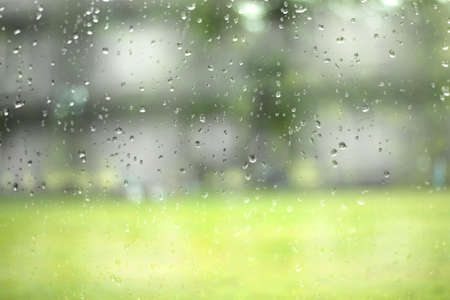 Glass with natural water drops. Abstract background.の写真素材