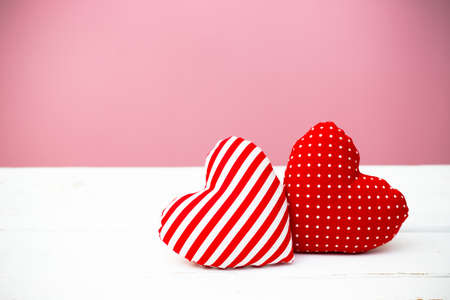 Valentine hearts on wooden background. Minimal concept.の写真素材