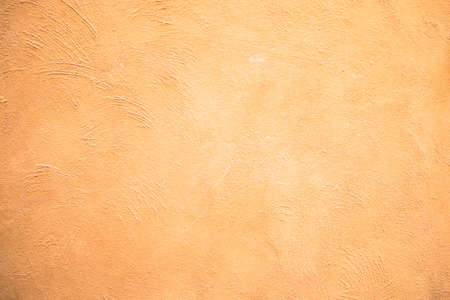 Abstract yellow cement wall texture background