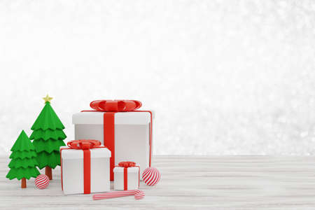 Christmas tree, gift box, ball, candy cane decorate on table blurred light bokeh background....