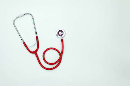 Stethoscope on green background top view. Medical toolの写真素材