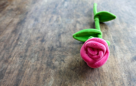 Valentines day pink rose on wooden background, love conceptの写真素材