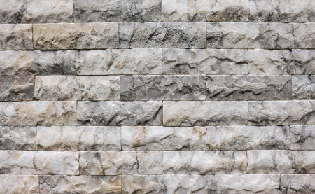 gray granite brick seamless texture or background, close up