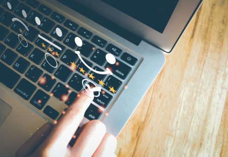 Concept of customer's satisfaction and service, businesswoman using laptop to express their...