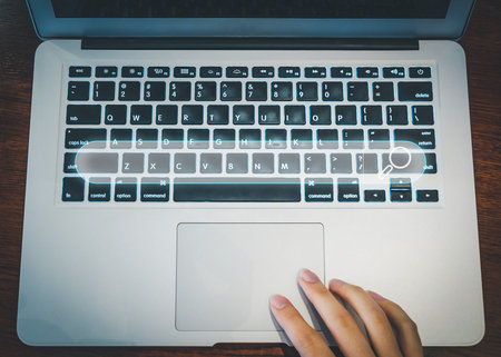 SEO Search engine optimization, Search technology, women's hands using a computer keyboard to search for information, using websites search bar to find the desired information or shopping online.の写真素材