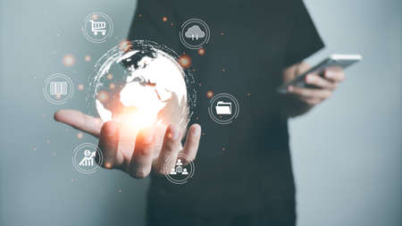 Concept global data connection with internet technology, users are using smartphone for online transactions by internet technology, big data, database management, cloud computing, cashless society.の写真素材