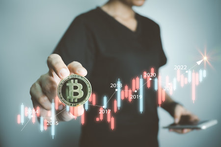 Cryptocurrency Investor holding bitcoin, analyzing graph with smartphone, businessman forecast growth of Blockchain technology, future of financial, Decentralized financi DeFi, Global Economy.の写真素材