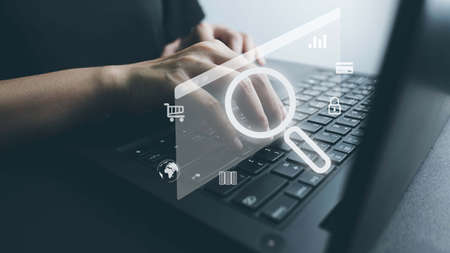 SEO Search Engine Optimization, Searching for information on Internet with PC, using website search bar to find the desired data, global data connection, shopping online, database storage system.の写真素材