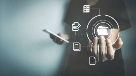 Document Management System (DMS), Online document database management, Organization document Organized, automated processes to manage files, ERP enterprise efficient, business technology.の写真素材