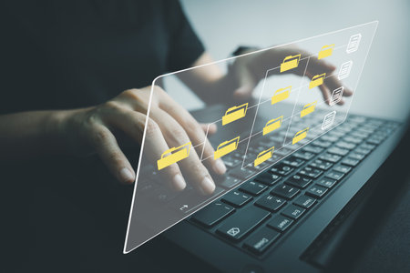 Officer using laptop manage files, Document Management System (DMS), Online document database management, automated processes to manage system, ERP enterprise efficient, business technology.の写真素材