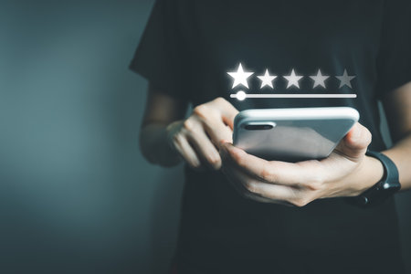Satisfied customer experience concept, happy business customer using smartphone, the best review, High quality service, Most rated, the highest score, 5 stars, Social media very good.の写真素材