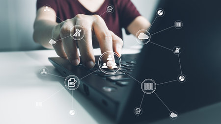 Concept global data connection with internet technology, users are using labtop for online transactions by internet technology, big data, database management, cloud computing, cashless society.の写真素材