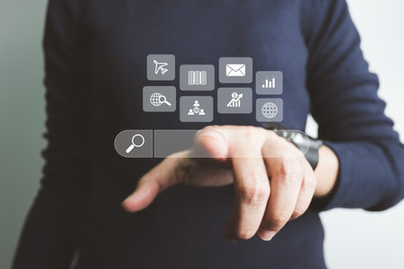 Search Engine optimization SEO concept, Businesswoman is using finger point to search for information on Internet, Using the search bar, Wireless Network, big data and accessing website information.の写真素材