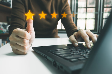 Officer showing the symbol of top service 5 star quality assurance, excellent warranty, world standard, ISO certification, development and improve the quality of the organization concept.の写真素材