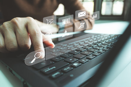 SEO Search engine optimization, Search technology, women's hands using a computer keyboard to search for information, using websites search bar to find the desired information or shopping online.の写真素材