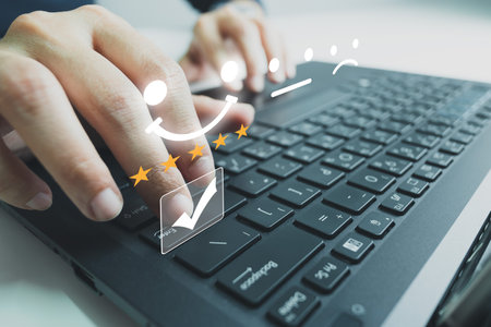 Concept of customer satisfaction and service, businesswoman using laptop to express their opinion, answer and satisfied score, best service, feedback from guest.の写真素材