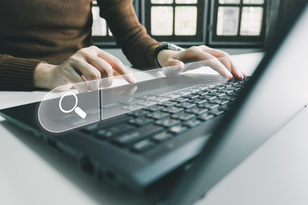 SEO Search engine optimization, Search technology, women's hands using a computer keyboard to search for information, using websites search bar to find the desired information or shopping online.の写真素材