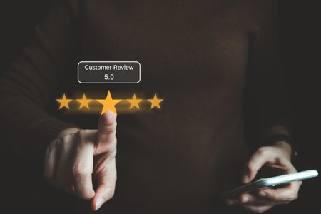 Satisfied customer experience concept, happy business customer using smartphone, the best review, High quality service, Most rated, the highest score, 5 stars, Social media very good.の写真素材