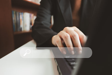 SEO Search engine optimization, Search technology, client using a computer keyboard to search for information, using website search bar to find data, information or shopping online.の写真素材