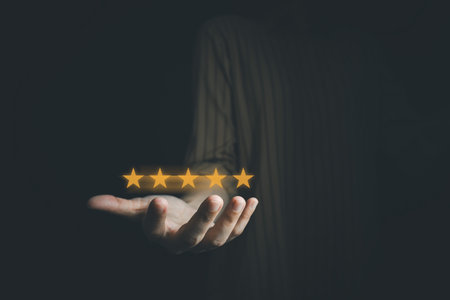 Businesswoman show the symbol of 5 fives star quality assurance, excellent warranty, world standard,...