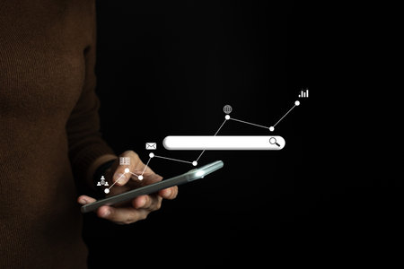 Search engine optimization SEO , Search technology, using mobile phone to search for information, using websites search bar to find the desired information or shopping onlineの写真素材