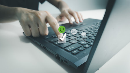 Satisfaction concept of customer, express their opinions, answers and satisfied scores, client is satisfied with pressing smile face icon, excellent service, good feedback from userの写真素材