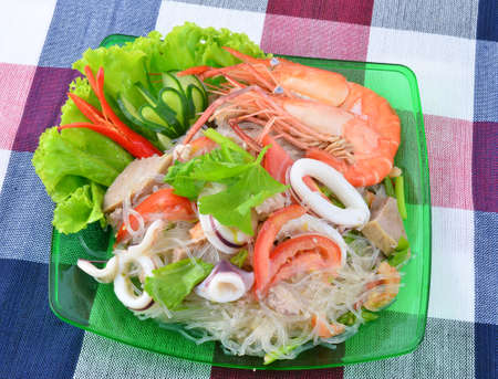 Thai spicy seafood and vermicelli Salad の写真素材