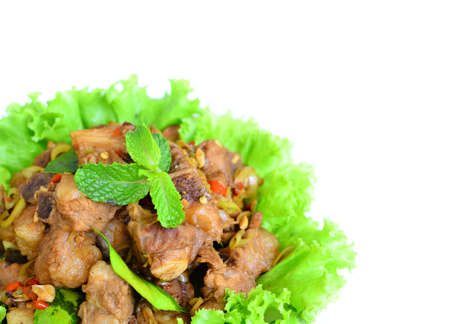 Fried pork with herbの写真素材