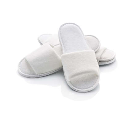 White casual home slippers on white backgroundの写真素材