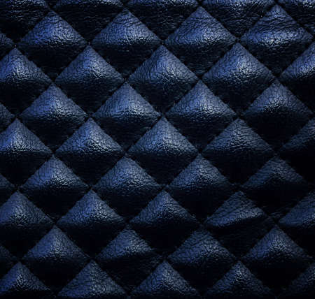 Black leather upholstery texture with great detail for backgroundの写真素材
