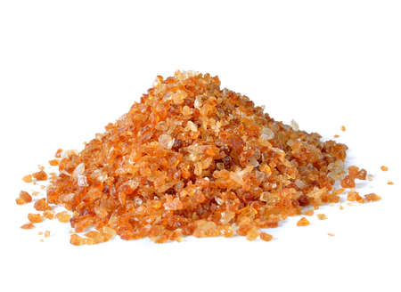 Brown caramelized sugar on white background
