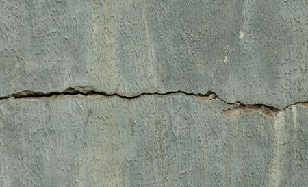Many small cracks on white plaster. Grunge.