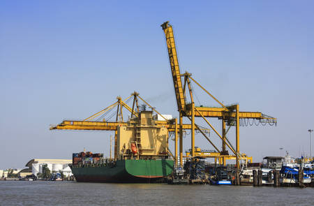Transport container ship dock on chao phraya riverのeditorial素材
