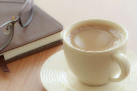 Coffee cup on wooden tableの写真素材