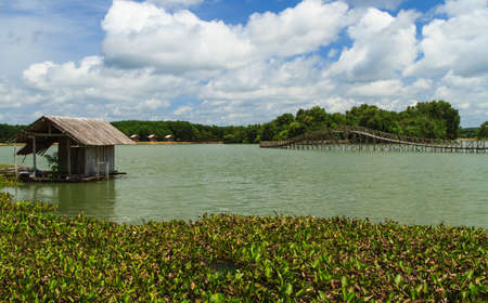 Floating cottage on the riverの写真素材