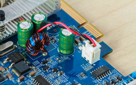 Electronic circuits on wood background