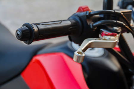 Close up of racing motorcycle handlebar and brake lever.の写真素材